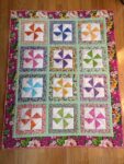 Joyce Pinwheel Baby Quilt